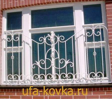 Фотографии кованых решеток на окно