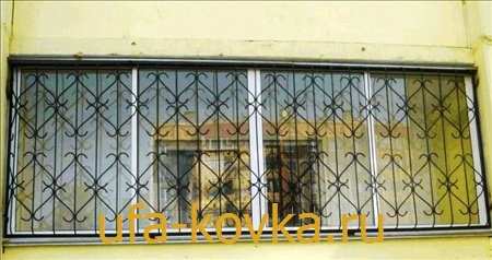 Фотографии кованых решеток на балкон